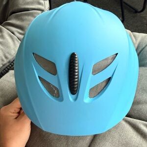 Light blue ski helmet